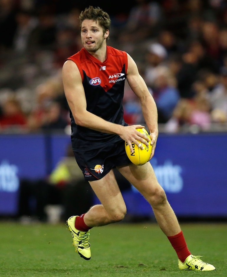 AFL 2015 Rd 23 - Melbourne v GWS Giants MELBOURNE, AUSTRALIA - SEPTEMBER 6: Jesse Hogan of the Demons in action during the 2015 AFL round 23 match between the Melbourne Demons and the GWS Giants at Etihad Stadium, Melbourne, Australia on September 6, 2015. (Photo by Michael Willson/AFL Media)